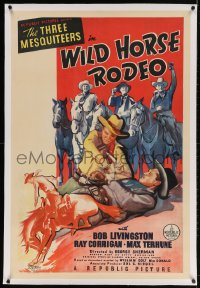 4h390 WILD HORSE RODEO linen 1sh 1937 cool art of The Three Mesquiteers catching the bad guy!