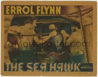 4k305 SEA HAWK LC 1940 great c/u of barechested Errol Flynn holding sword at man's throat!