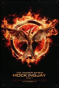 4r705 HUNGER GAMES: MOCKINGJAY - PART 1 teaser DS 1sh 2014 logo, fire burns brighter in the darkness