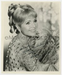 4x756 DEBBIE REYNOLDS signed 8x10 REPRO still 1970s smiling portrait with floral print & feathers!