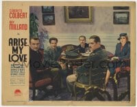 5b182 ARISE MY LOVE LC 1940 news reporter Claudette Colbert sitting with four others at table!