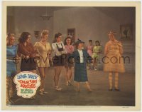 5b299 DANCING MASTERS LC 1943 wacky image of girls in dance studio with Stan Laurel in dress!