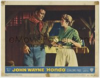 5b473 HONDO 3D LC #1 1953 close up of cowboy John Wayne handing pistol to pretty Geraldine Page!
