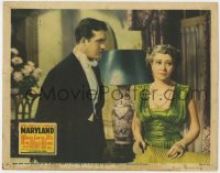 5b573 MARYLAND LC 1940 close up of John Payne in tuxedo with worried Fay Bainter, horse racing!