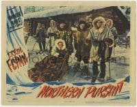 5b639 NORTHERN PURSUIT LC 1943 Mountie Errol Flynn outside with Julie Bishop all bundled up on sled!