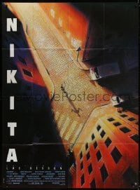 5j529 LA FEMME NIKITA French 1p 1990 Luc Besson, cool overhead art of Anne Parillaud in alley!