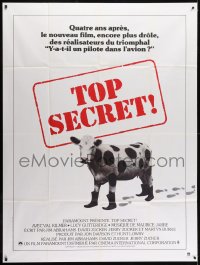 5j904 TOP SECRET French 1p 1984 Zucker Bros. James Bond spy spoof, wacky image of cow with boots!