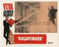 5m539 GOLDFINGER LC #3 R1970 Sean Connery as James Bond watches Oddjob get electrocuted on fence!