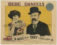 5m587 KISS IN A TAXI LC 1927 close up of sexy Bebe Daniels staring at wacky Chester Conklin!