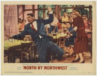 5m643 NORTH BY NORTHWEST LC #8 1959 Alfred Hitchcock, Eva Marie Saint shoots at Cary Grant in cafe!