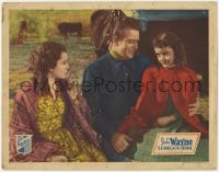 5m650 OREGON TRAIL LC 1936 great c/u of John Wayne with Ann Rutherford & young girl, very rare!