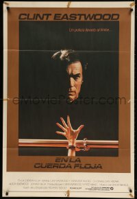 5p558 TIGHTROPE Argentinean 1984 Clint Eastwood is a cop on the edge, cool handcuff image!