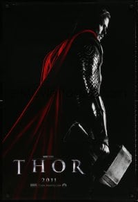 5t885 THOR teaser DS 1sh 2011 cool image of Chris Hemsworth w/classic hammer, shows title!