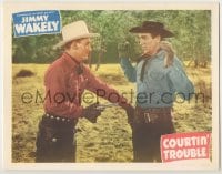 5w346 COURTIN' TROUBLE LC #4 1948 close up of cowboy Jimmy Wakely holding bad guy at gunpoint!