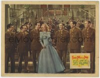 5w443 FOUR JILLS IN A JEEP LC 1944 pretty smiling Carole Landis surrounded by soldiers & band!