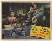 5w864 THEY GOT ME COVERED LC 1943 Dorothy lamour smiles at Bob Hope sitting on desk & smoking!