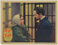 5w932 WE LIVE AGAIN LC 1934 close up of Anna Sten & Fredric March talking behind prison bars!