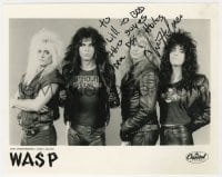 6b599 CHRIS HOLMES signed 8x10 publicity still 1986 the lead guitarist posing with his band, WASP!