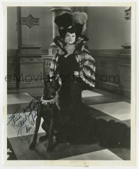 6b878 MAE WEST signed 8x10 REPRO still 1970s full-length in wild outfit with her big dog!
