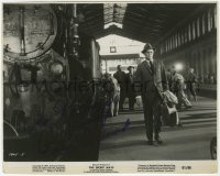 6b362 RICHARD WIDMARK signed 7.75x9.5 still 1961 great image standing by train in The Secret Ways