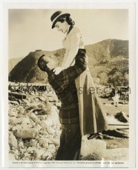 6h845 SPOILERS 8.25x10 still 1942 romantic c/u of John Wayne lifting pretty Margaret Lindsay!