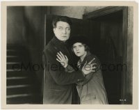6h905 THREE FACES EAST 8x10.25 still 1926 c/u of Clive Brook protecting scared Jetta Goudal!