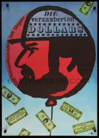 6p281 AZ ELVARAZSOLT DOLLAR East German 23x32 1987 Istvan Bujtor, art of man in balloon plus money!