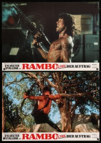 6p059 RAMBO FIRST BLOOD PART II group of 2 German LCs 1985 no man, no law, no war can stop Stallone!