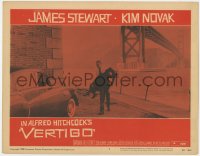 6w506 VERTIGO LC #7 1958 Alfred Hitchcock, James Stewart carrying blonde Kim Novak by bridge!