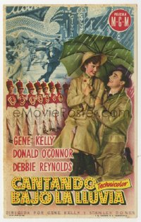 7a672 SINGIN' IN THE RAIN Spanish herald 1953 Gene Kelly & Debbie Reynolds under umbrella!