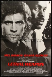 7b585 LETHAL WEAPON advance 1sh 1987 great close image of cop partners Mel Gibson & Danny Glover!