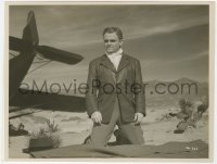 7f211 BRIDE CAME C.O.D. 8x10 key book still 1941 c/u of James Cagney kneeling in desert by plane!