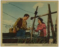 7f040 GIANT color 8x10 still #5 1956 cool close up of James Dean & Elizabeth Taylor behind fence!