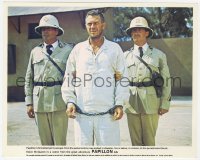7f069 PAPILLON color English FOH LC 1973 Steve McQueen escorted by two guards on Devil's Island!