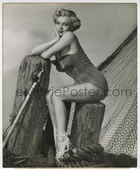 7f643 MARILYN MONROE 8.25x10 still 1951 sexy pose in swimsuit on boat dock from As Young As You Feel
