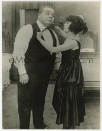 7h362 ROSCOE FATTY ARBUCKLE/MABEL NORMAND 10x13 still 1910s she's tying his tie too tight!