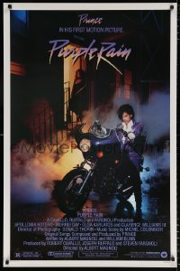 7k844 PURPLE RAIN 1sh 1984 great image of Prince riding motorcycle, in his first motion picture!