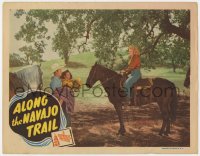 7p029 ALONG THE NAVAJO TRAIL LC 1945 Dale Evans stares at Roy Rogers carrying Estelita Rodriguez!