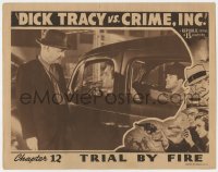 7p221 DICK TRACY VS. CRIME INC. chapter 12 LC 1941 Ralph Byrd in car showing badge, Trial By Fire!