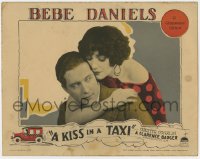 7p464 KISS IN A TAXI LC 1927 super close up of Bebe Daniels hugging Douglas Gilmore from behind!