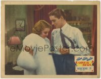 7p519 LOVE IS NEWS LC 1937 c/u of Loretta Young in fur coat fixing Tyrone Power's clothes!