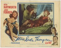 7p581 MISS SADIE THOMPSON LC 1953 Henry Slate plays harmonica for Rita Hayworth, filmed in Hawaii