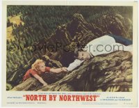 7p634 NORTH BY NORTHWEST LC #1 R1966 c/u of Cary Grant helping Eva Marie Saint climb Mt. Rushmore!