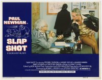 7p803 SLAP SHOT LC #3 1977 Paul Newman sitting on Strother Martin's desk & handing him a pen!