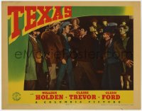 7p868 TEXAS LC 1941 young William Holden gets pushed by angry guy in crowd!