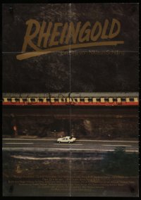 7r264 RHINEGOLD German 1978 Niklaus Schilling's Rheingold, car speeding past railroad train!