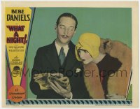 8a120 WHAT A NIGHT LC 1928 c/u of William Austin showing newspaper headline to flapper Bebe Daniels!