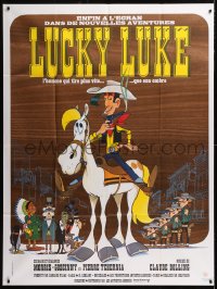 8b824 LUCKY LUKE French 1p 1971 great cartoon art of the smoking cowboy hero on his horse!