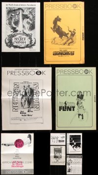 8d244 LOT OF 9 UNCUT PRESSBOOKS 1960s-1980s advertising for a variety of different movies!