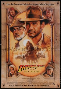 8k705 INDIANA JONES & THE LAST CRUSADE advance 1sh 1989 Ford/Connery over a brown background by Drew
